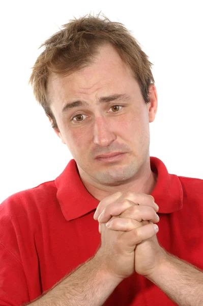 Mladý muž s smutný a uctivě modlitby — Stock fotografie