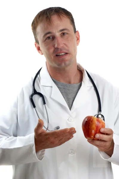 Le personnel médical explique les avantages des fruits — Photo