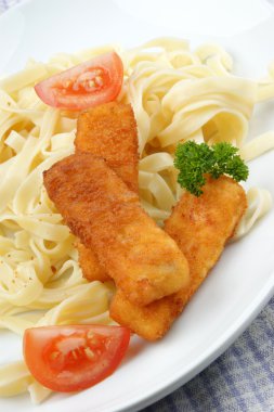 Fish sticks and home made noodles on a plate clipart