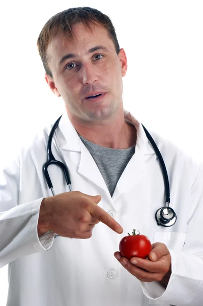 Personel medyczny wyjaśnia korzyści wynikające z warzyw — Zdjęcie stockowe