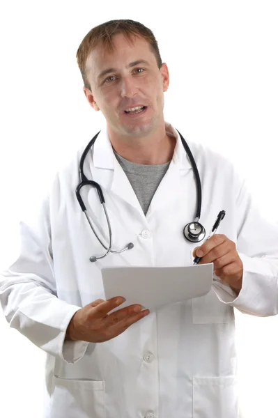 Personal médico tomando notas sobre el libro blanco — Foto de Stock