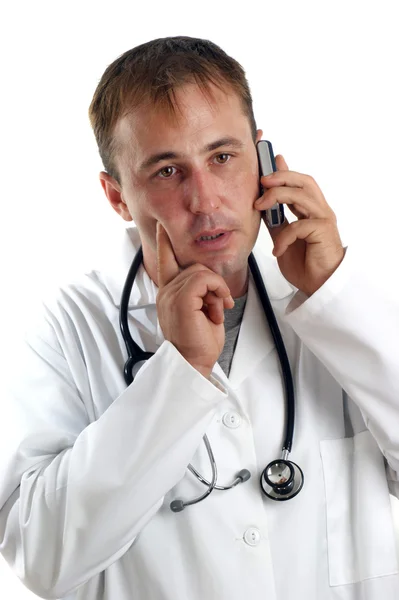 Жест медицинского персонала во время телефонного звонка — стоковое фото