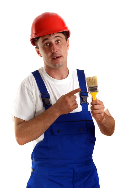 工匠带着一支画笔红色安全头盔 — 图库照片