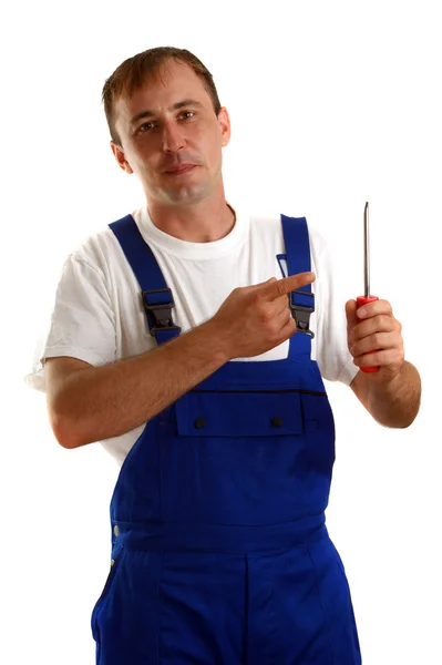 Artesãos está segurando uma chave de fenda em sua mão — Fotografia de Stock