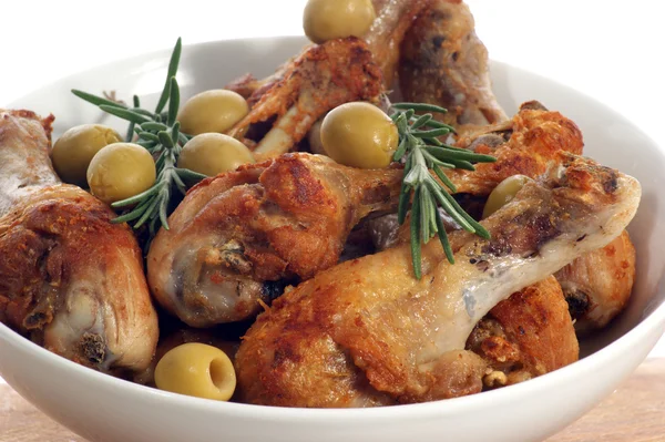 Mediterranean chicken legs with rosemary and olives — Stock Photo, Image