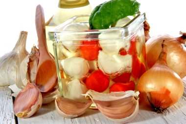 Mozzarella with cherry tomatoes in a jar with oil clipart
