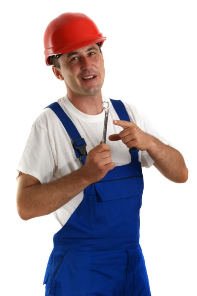 Handwerker mit Schutzhelm und Schraubenschlüssel — Stockfoto