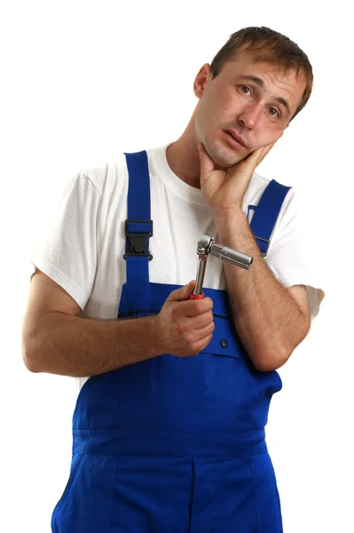 Hantverkare höll en skiftnyckel i handen — Stockfoto
