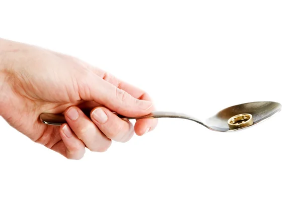 Spoon in Hand — Stock Photo, Image