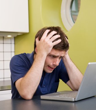 Worried at Computer clipart