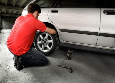 Changing a tire clipart