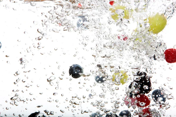 Vers fruit in water — Stockfoto