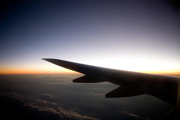 Západ slunce letadlo — Stock fotografie