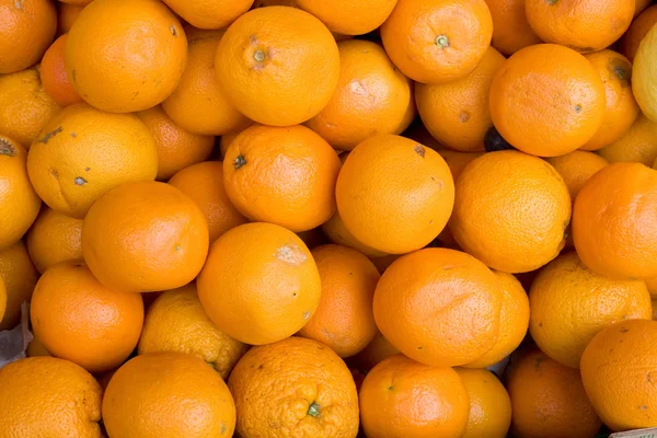 Apelsiner bakgrund — Stockfoto