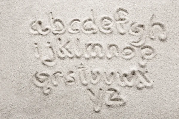 Песчаный алфавит — стоковое фото
