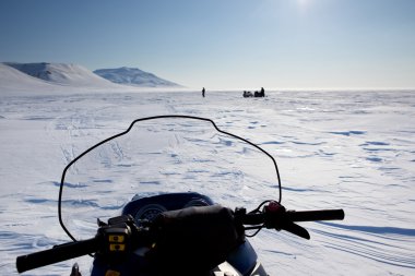 Snowmobile in Winter Landscape clipart