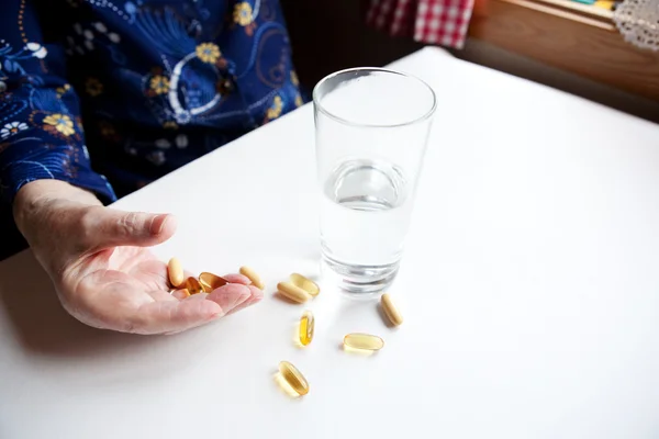 Old Hand with Pills — Stock Photo, Image