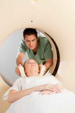 Patient in CT Scan clipart