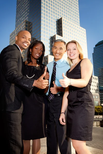 Business team tummen upp — Stockfoto