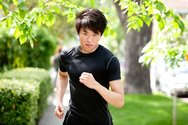 Allvarlig man jogging — Stockfoto