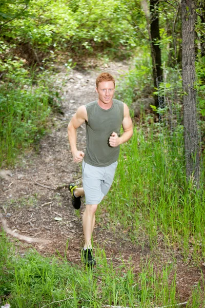 Pohledný muž, jogging — Stock fotografie