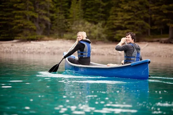 Canoe Adventure in Lake Stock Image