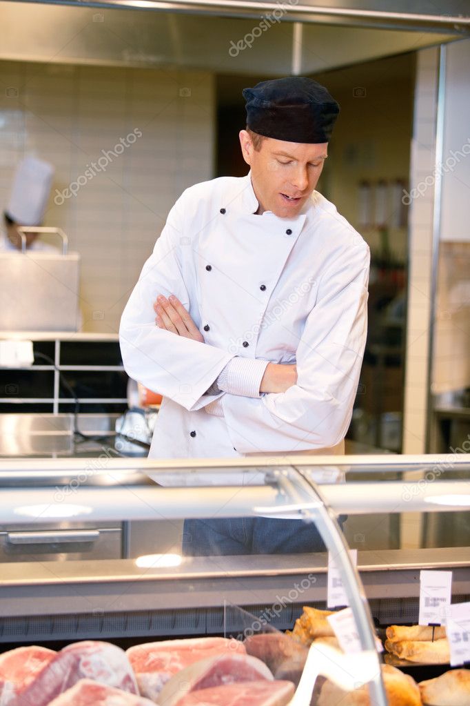 Butcher at Meat Counter