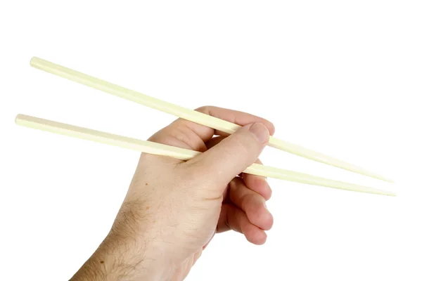 Ruka s hůlkami — Stock fotografie