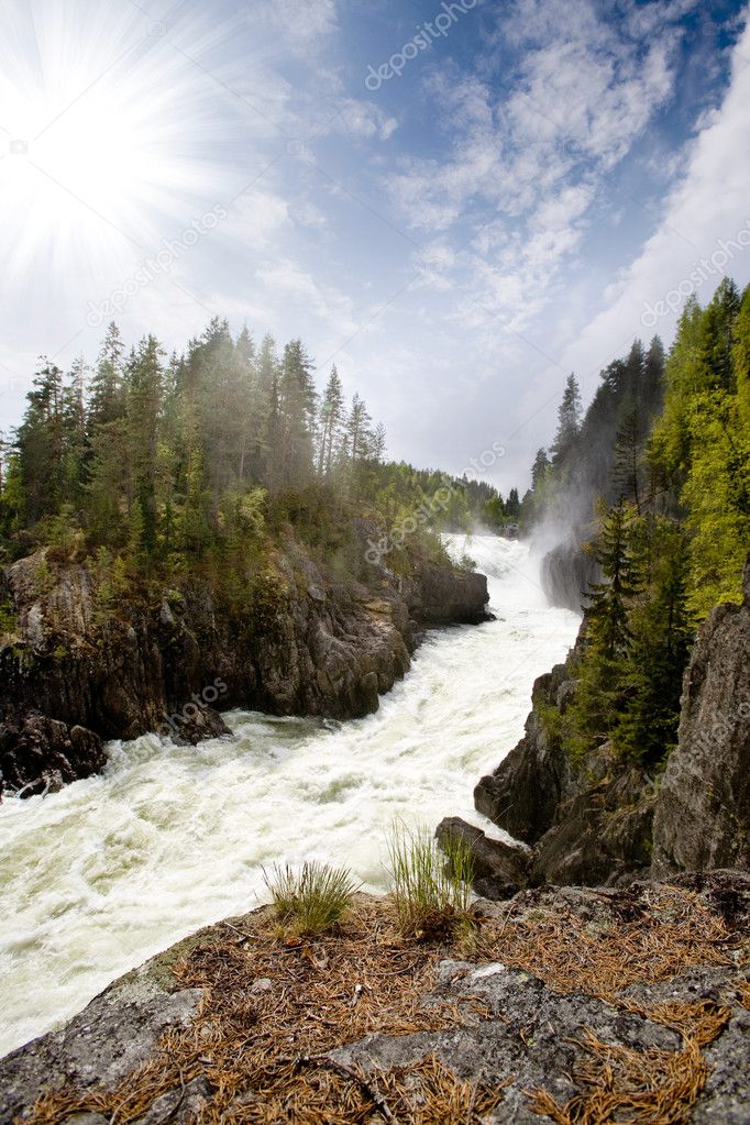 Waterfall in Norwegian Landscape