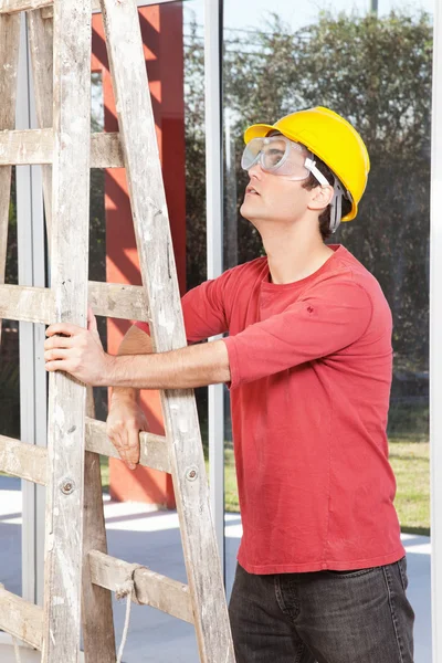 Architect holding ladder — Stock Photo, Image