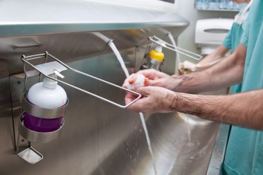 Doctors washing hands clipart