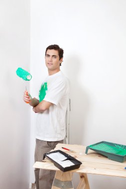 Man with paint roller clipart