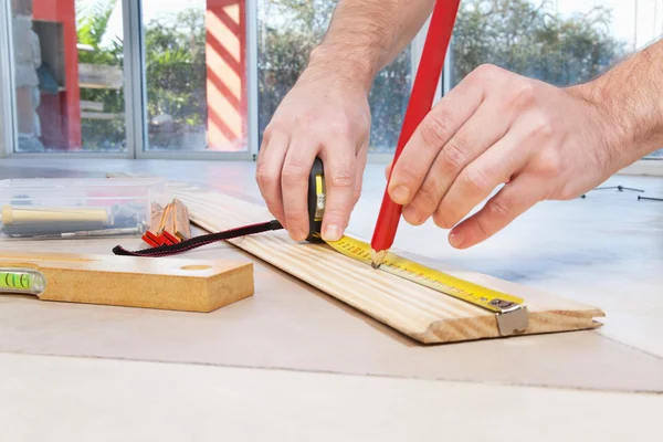 Engineer marking on plywood — Stock Photo, Image