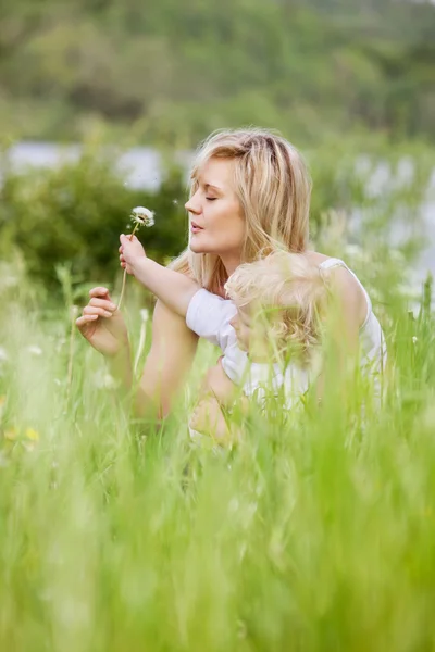 stock image Mother and Son in Meadow Making Wishes