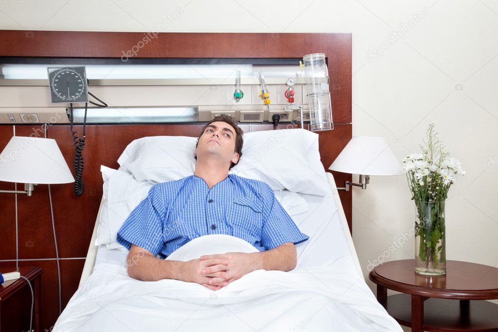 Young patient lying on bed
