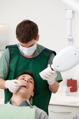 Dentist Preparing X-ray clipart