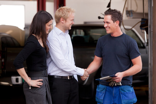 Mechanic with Happy Customer