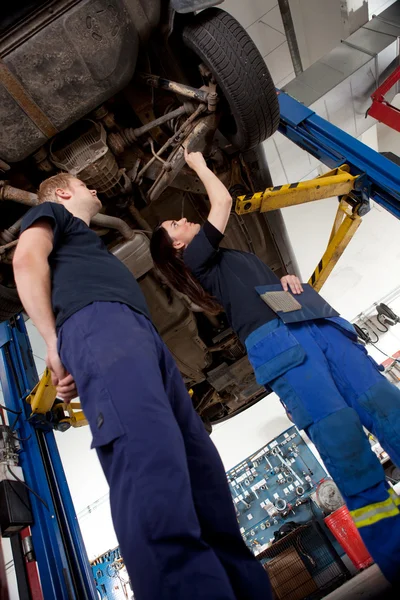 Two Mechanics Looking at Car — Stock Photo, Image