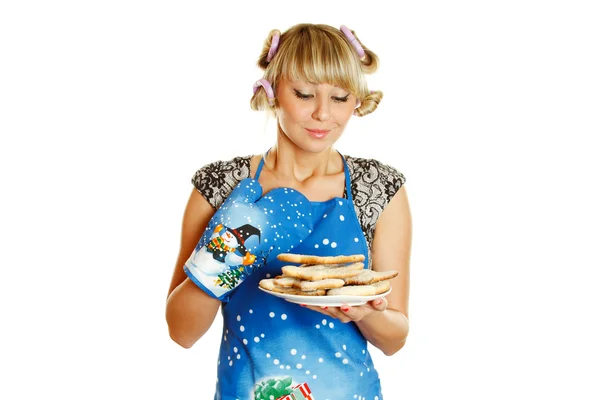Closeup of a woman with a plate of cookies Stock Photo