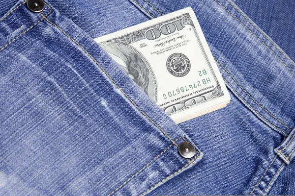 Dollar är jeans ficka — Stockfoto
