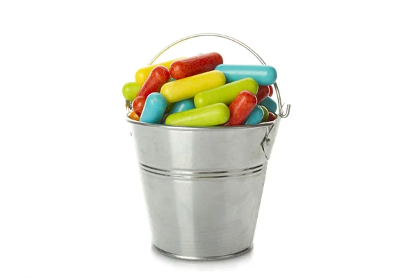 Doces coloridos no balde — Fotografia de Stock