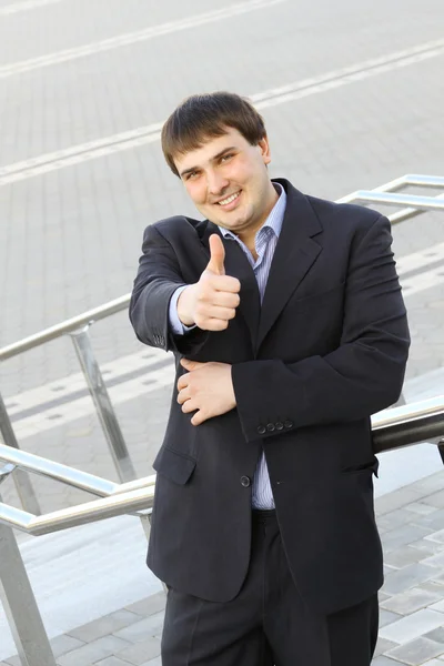 Podnikatel s palcem nahoru — Stock fotografie
