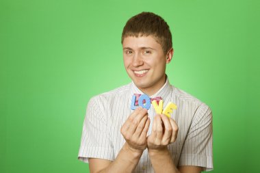 Close-up lover man holding the letter 