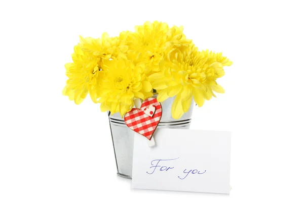 Yellow chrysanthemums in a pail Royalty Free Stock Photos