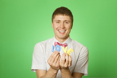 Close-up lover man holding the letter 