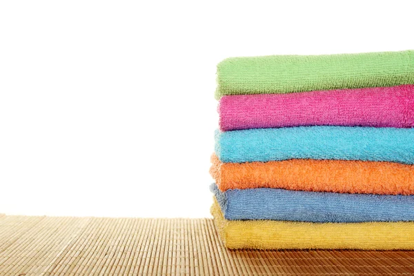 Lots of colorful bath towels — Stock Photo, Image