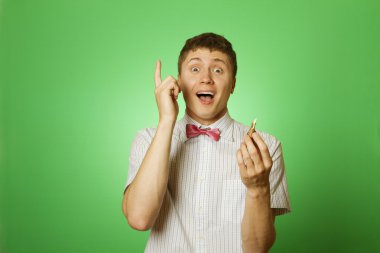 Young man holds a flower bulb clipart