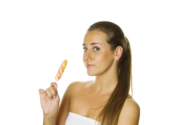 Attractive girl with a lollipop — Stock Photo, Image