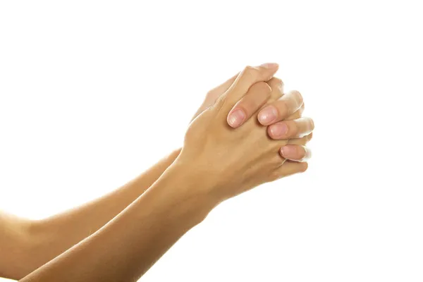 Руки женщины в молитве — стоковое фото