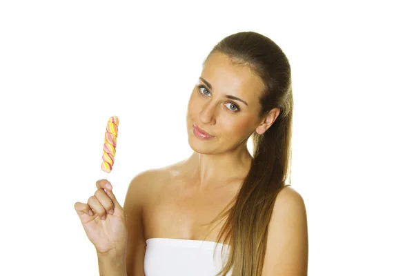 Attractive girl with a lollipop — Stock Photo, Image